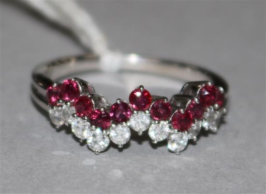 A ruby and diamond zig-zag line-set ring, 18ct white gold shank